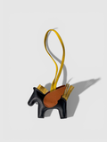Pegasus leather bag charm by Rivolla — smooth leather horse with contrast wing and tassel mane detail