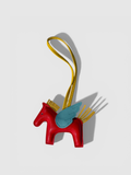 Pegasus leather bag charm by Rivolla — smooth leather horse with contrast wing and tassel mane detail