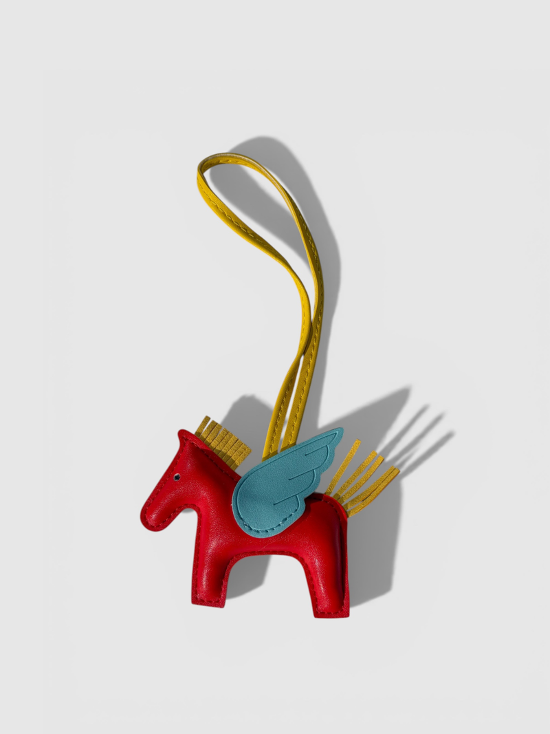 Pegasus leather bag charm by Rivolla — smooth leather horse with contrast wing and tassel mane detail